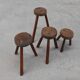 Brutalist French solid oak tripod stool with metal rim, 1850s