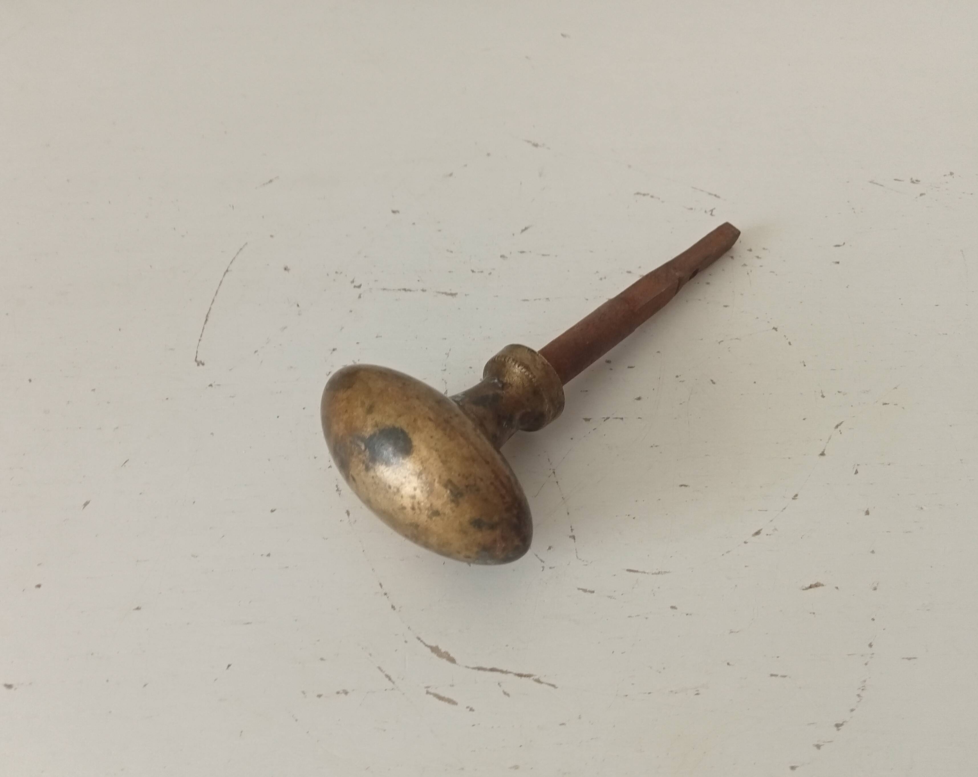 Antique olive door handle from the 19th century.