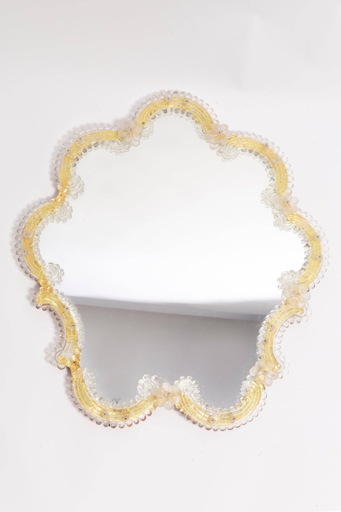 Mid-century decorative mirror in a floral frame, Italy, 1960s.