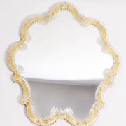 Mid-century decorative mirror in a floral frame, Italy, 1960s.
