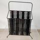 “Santiago” magazine rack in perforated sheet metal Mathieu Mategot 1950s