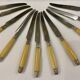 11 couteaux art déco, Bakélite et plaqué argent dans un coffret