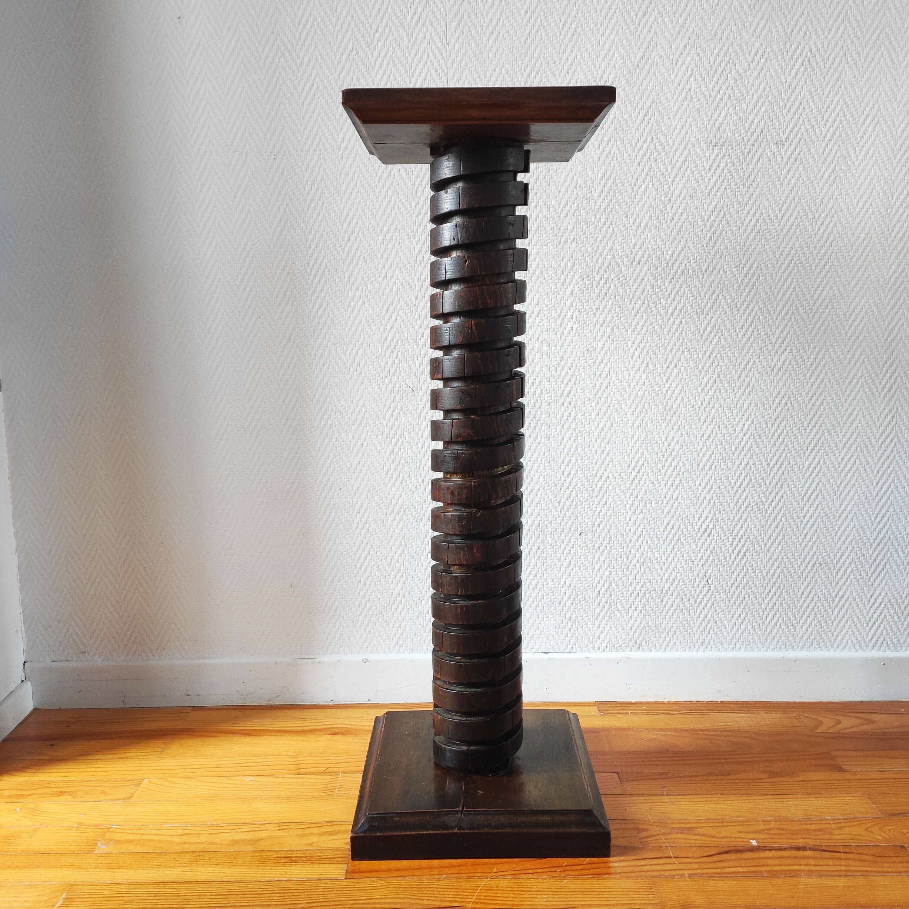 Brutalist column – old Burgundy press screw