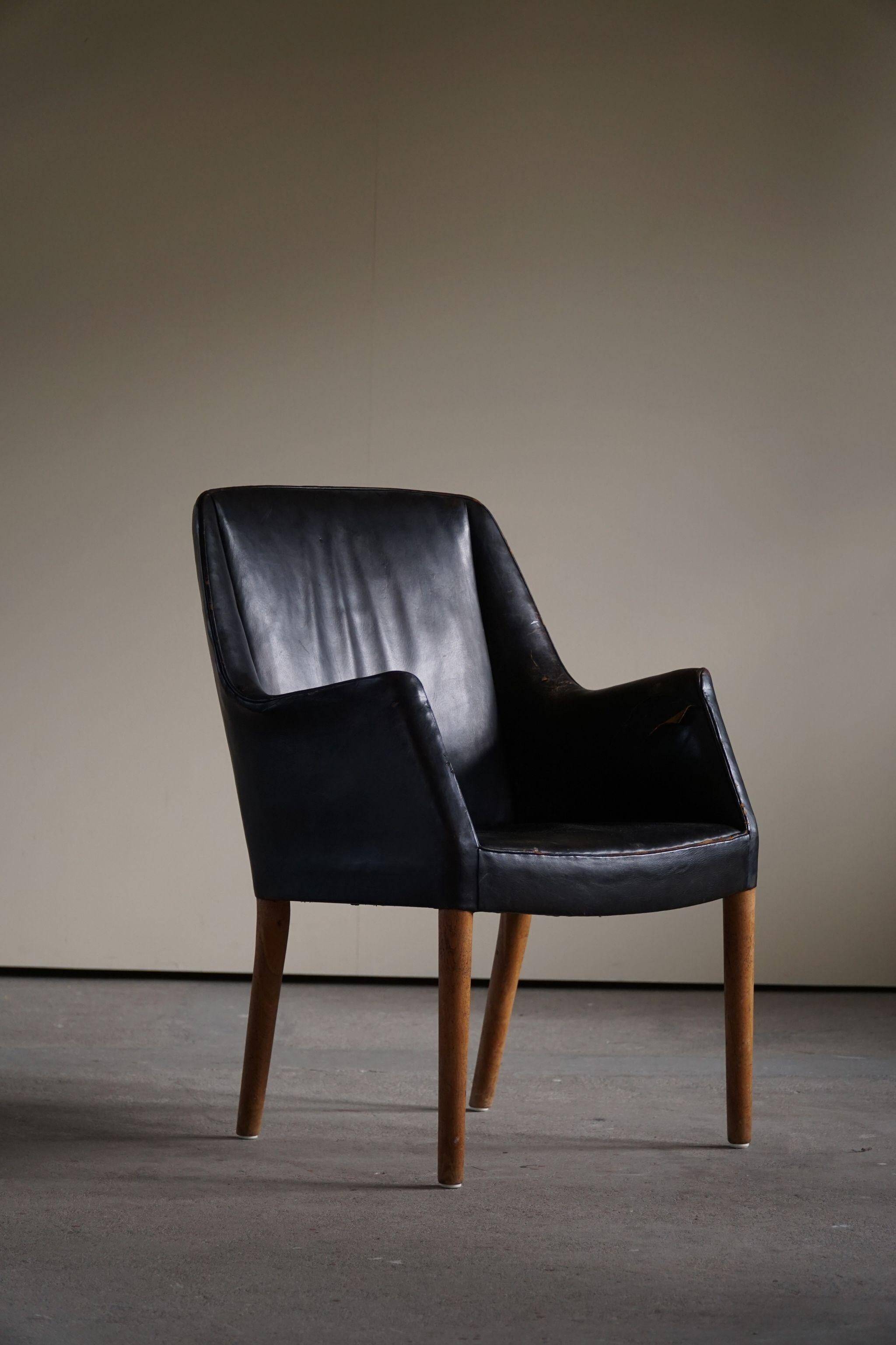 Fauteuil Danemark Moderne par Nanna Ditzel en chêne et cuir patiné, années 1950