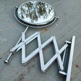 Telescopic magnifying mirror