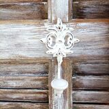 Vintage shutter renovated into a coat rack