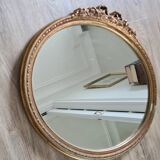 Ancien miroir ovale avec cadre doré