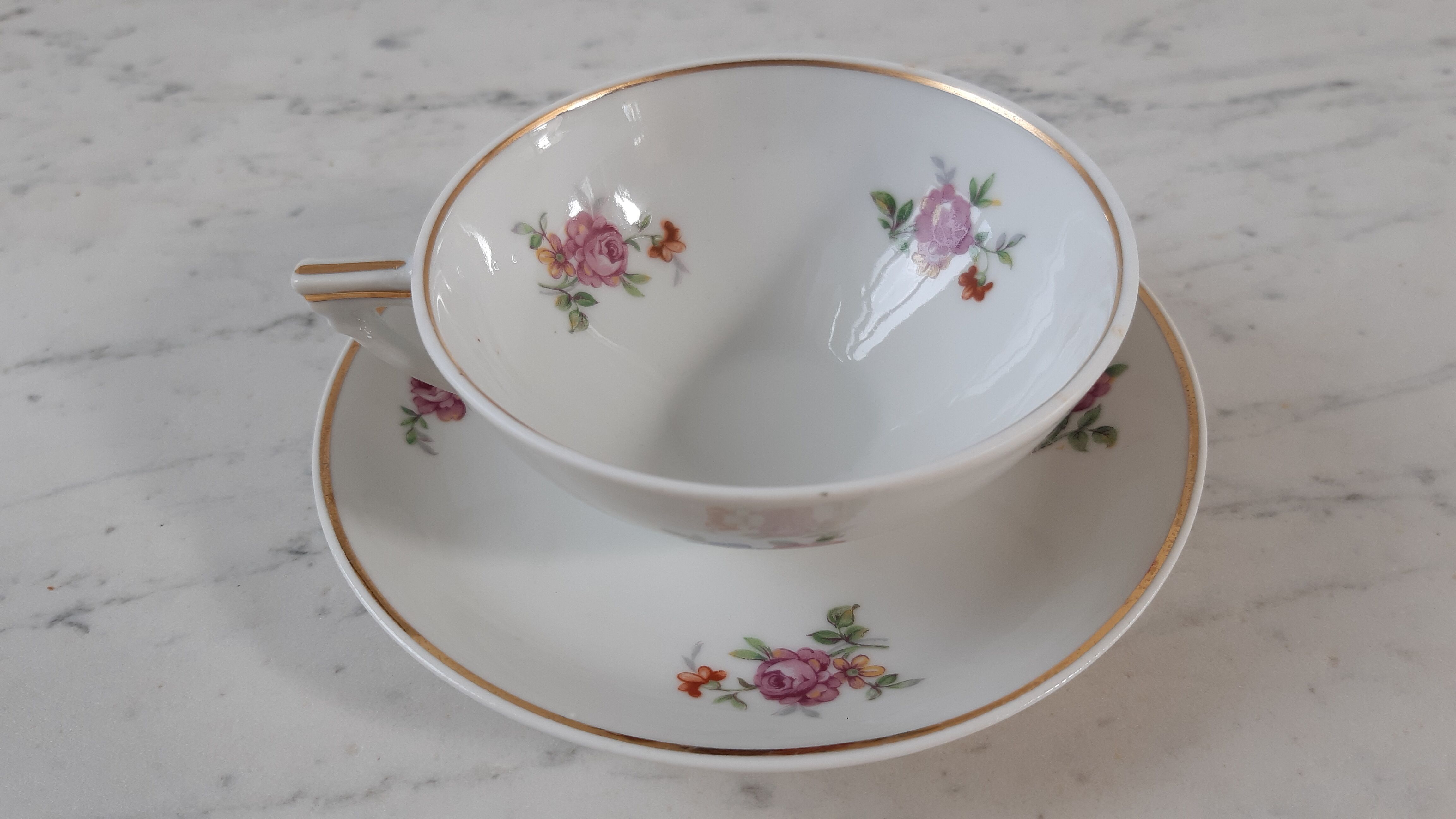 Service à café composé d'une cafetière et de 6 tasses et sous-tasses Limoges "Pallas" début XXème