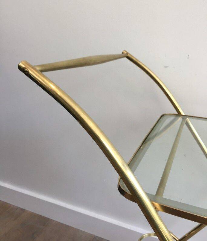 Italian designer rolling table in brass and engraved glass