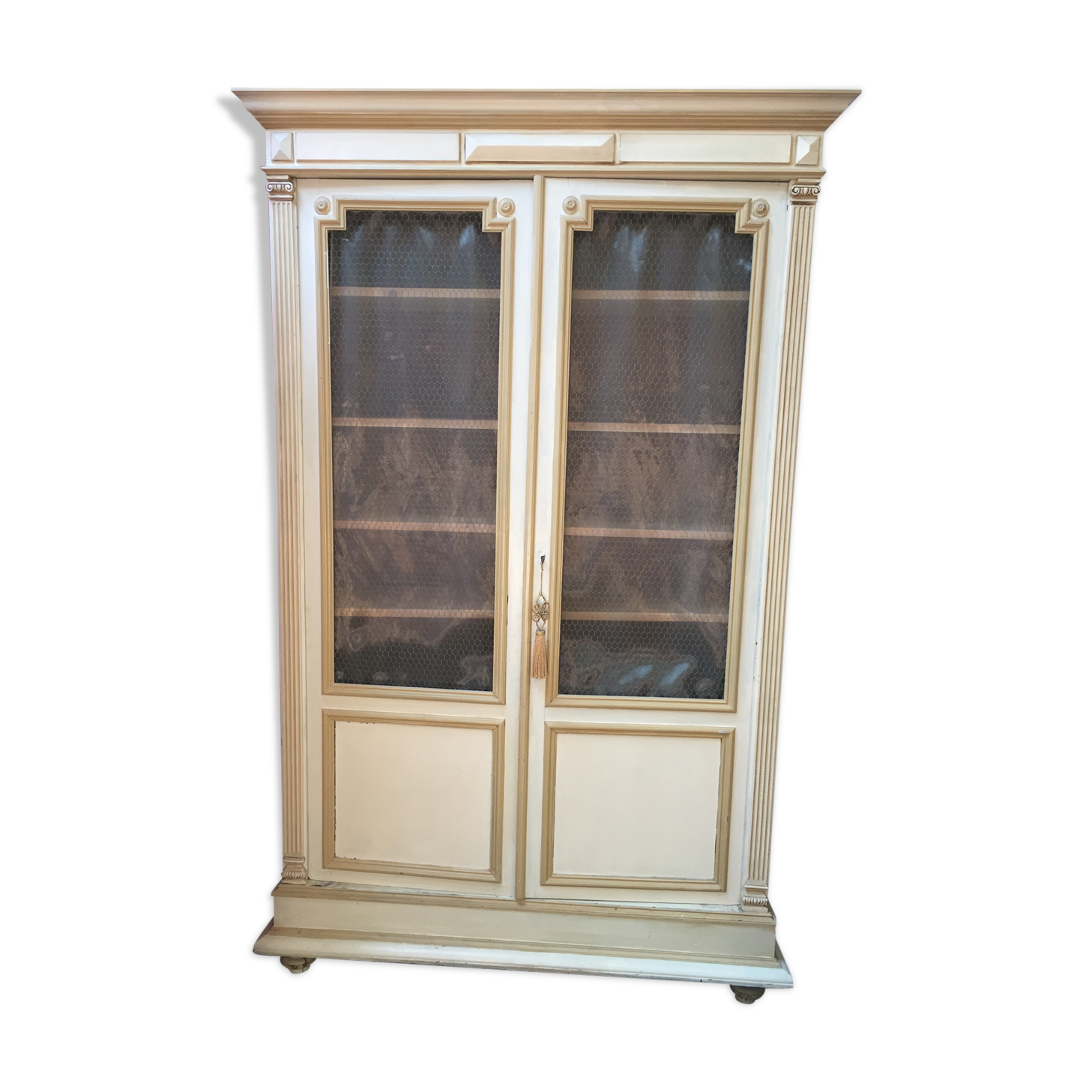 Bookcase 2 painted in ochre and cream mesh doors beginning 20 th