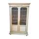Bookcase 2 painted in ochre and cream mesh doors beginning 20 th