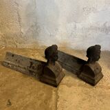 Pair of cast iron andirons with face
