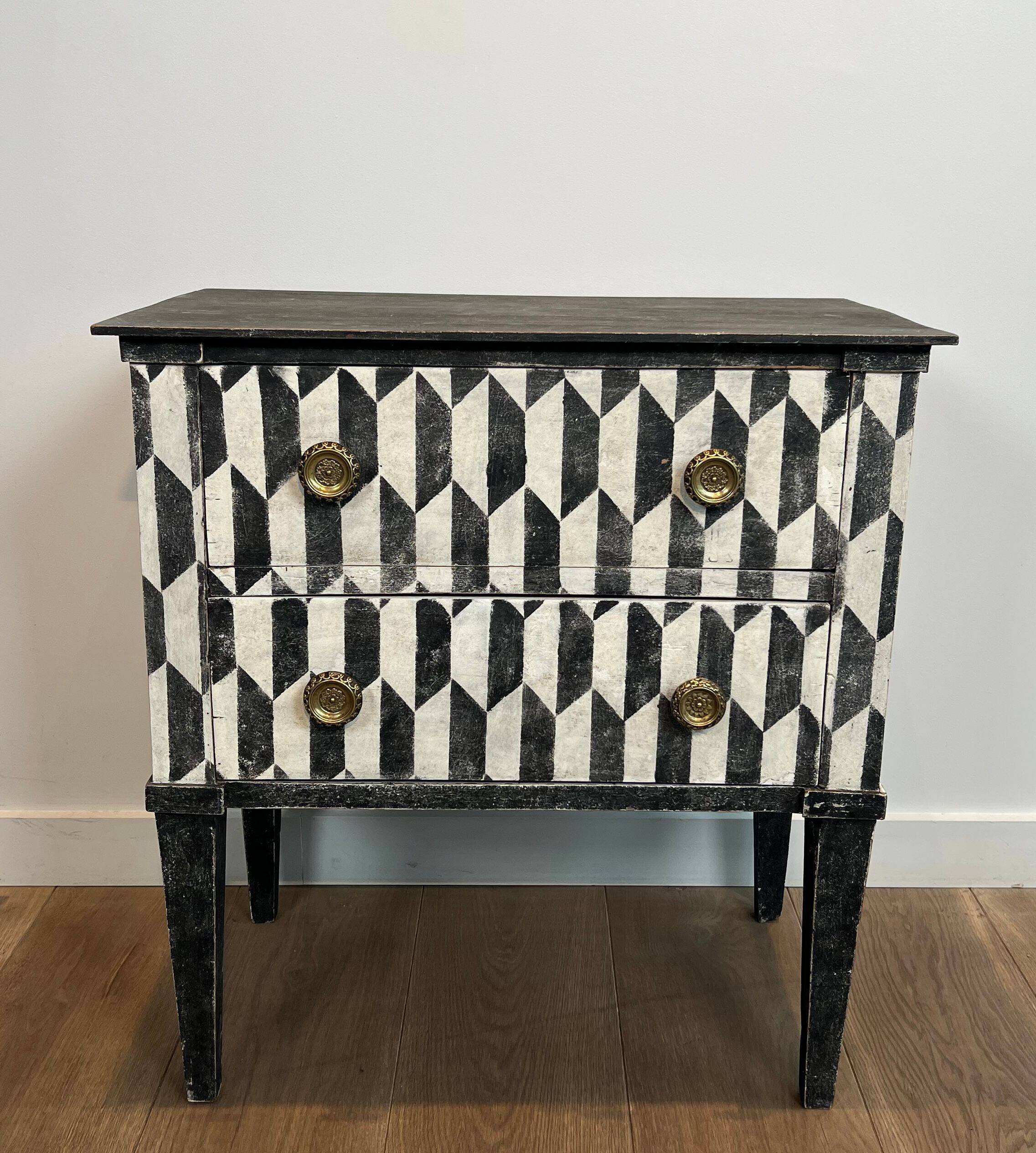 Small Italian chest of drawers with two drawers, patinated with a trompe-l'œil checkerboard pattern