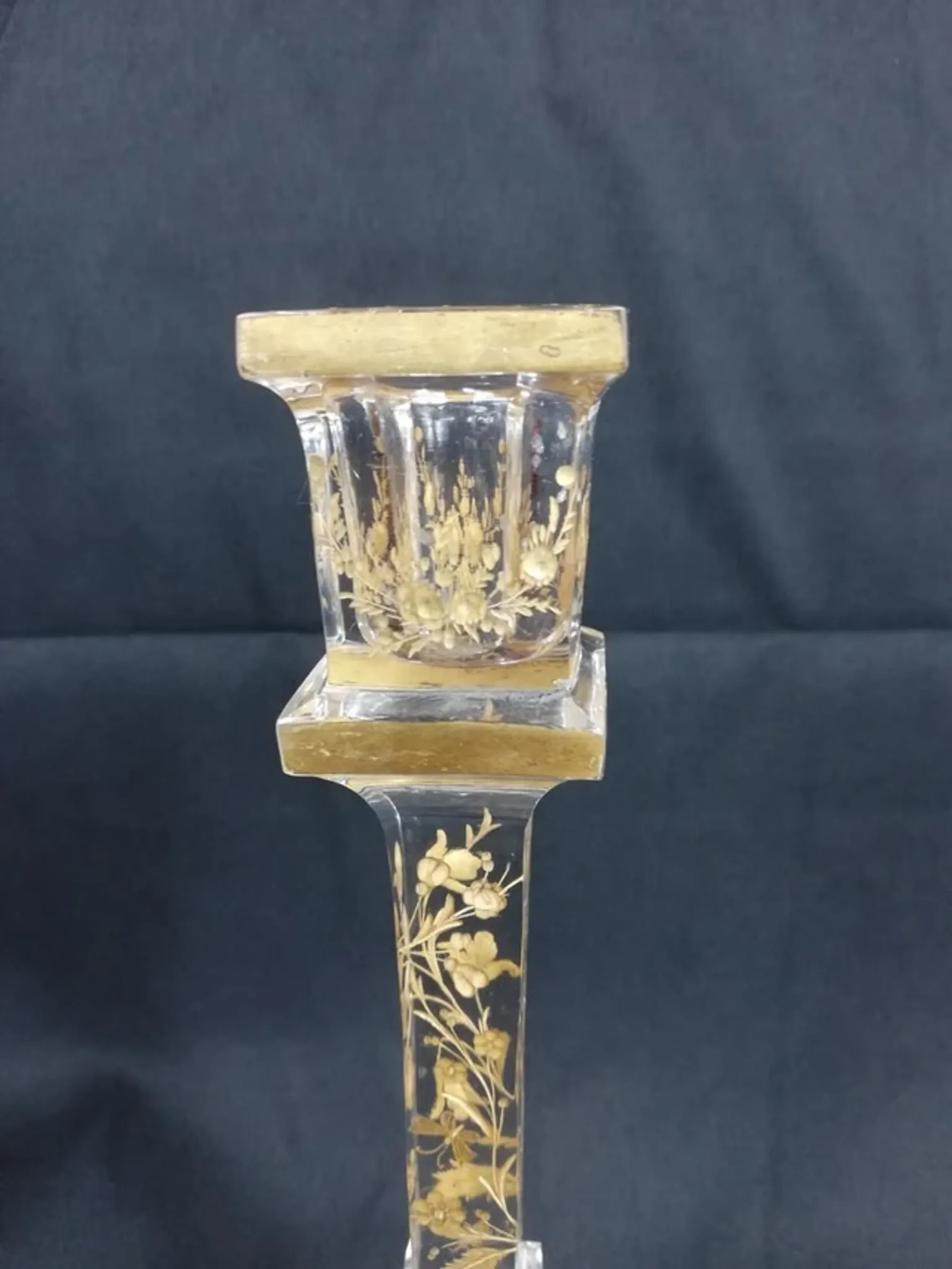 Antique glass candle holder, engraved and gilded.