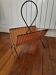 Metal and rattan magazine rack