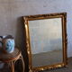 Miroir en bois doré biseauté