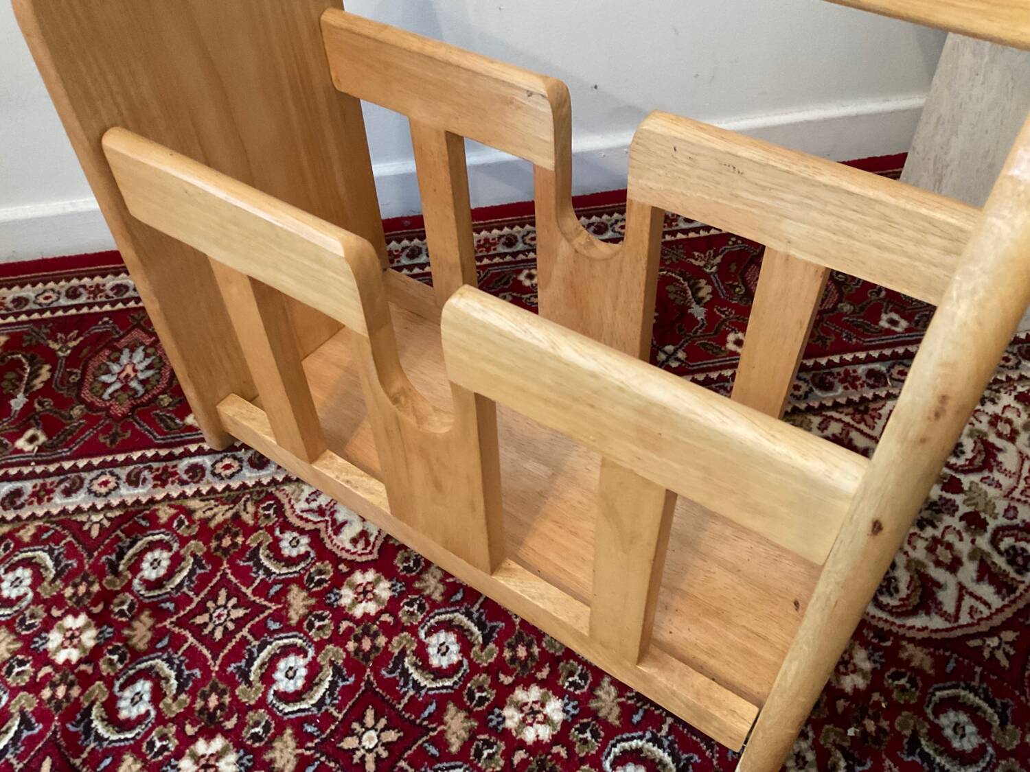 Vintage magazine rack in blond wood