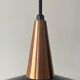 Scandinavian suspension in black metal, copper, and opal glass, 1970s design.
