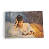 Young woman lying reading oil on panel