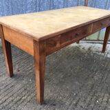Antique solid cherry farmhouse table with 2 front drawers.