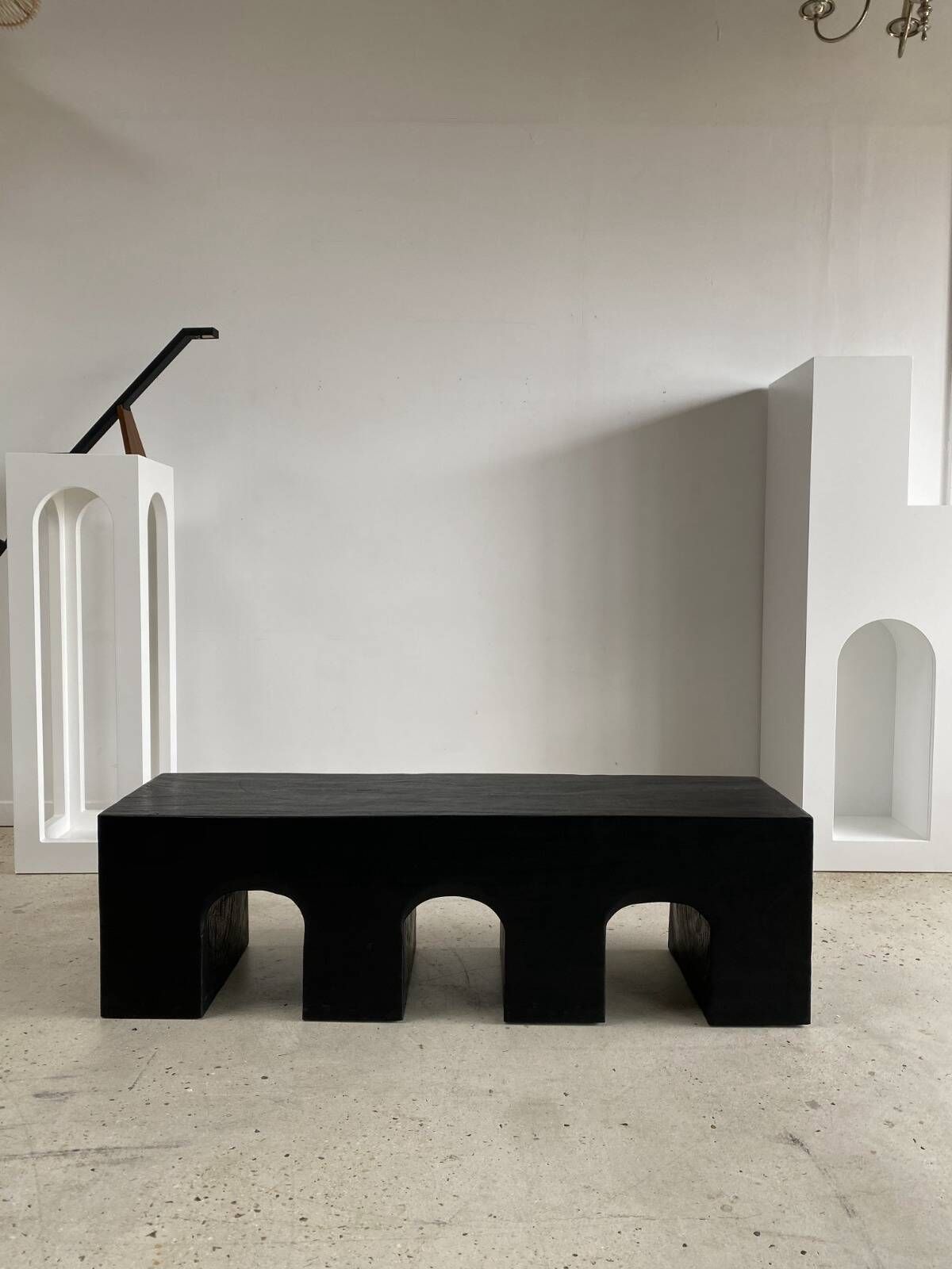 Bench in solid monoxyl wood, carved base in 3 arches - Black color
