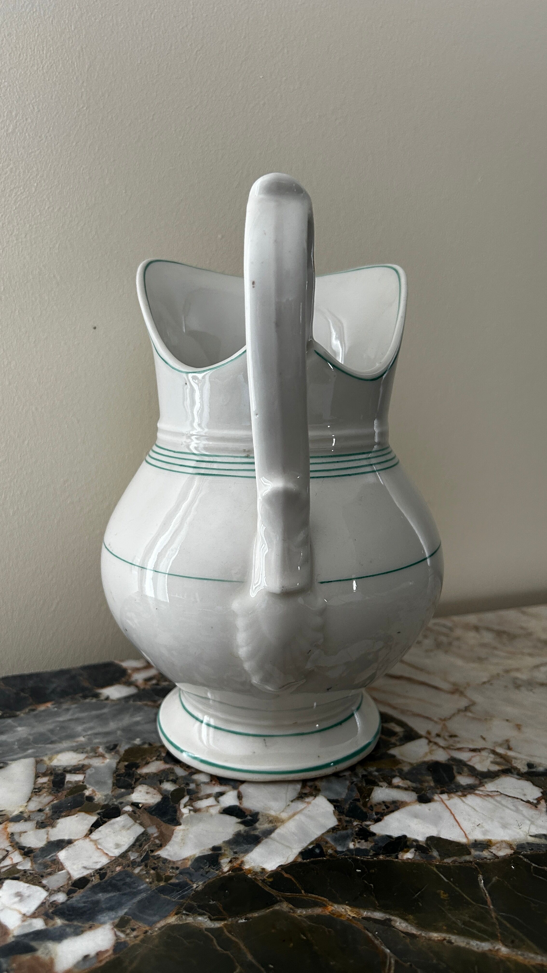 White toilet jug with green trim