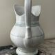 White toilet jug with green trim