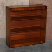 Pair of open dwarf bookshelves in mahogany by Shaws of London.