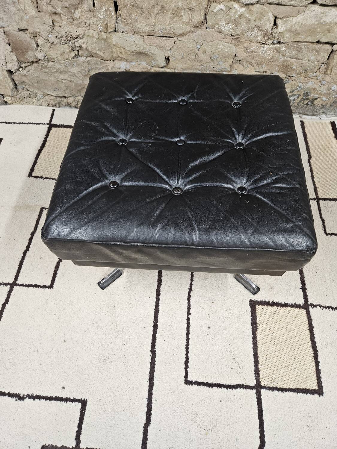 Black leather ottoman 1970 vintage