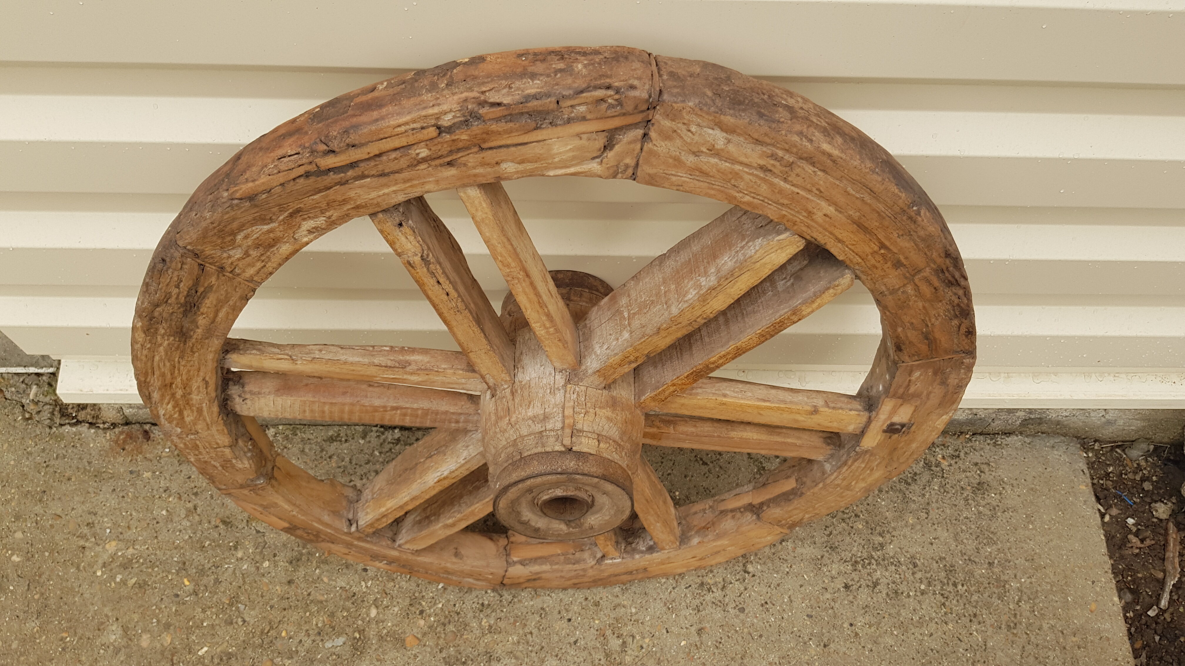 Old teak plow wheel