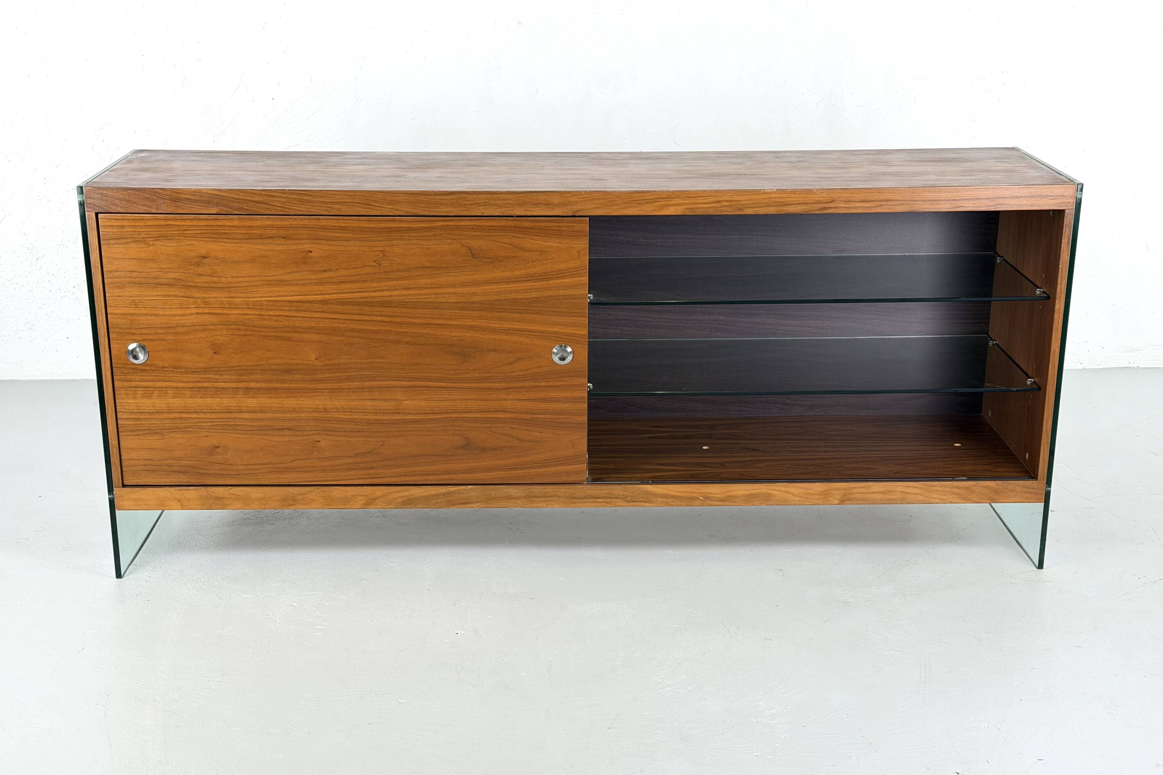 Teak sideboard with glass legs, France - 1990s