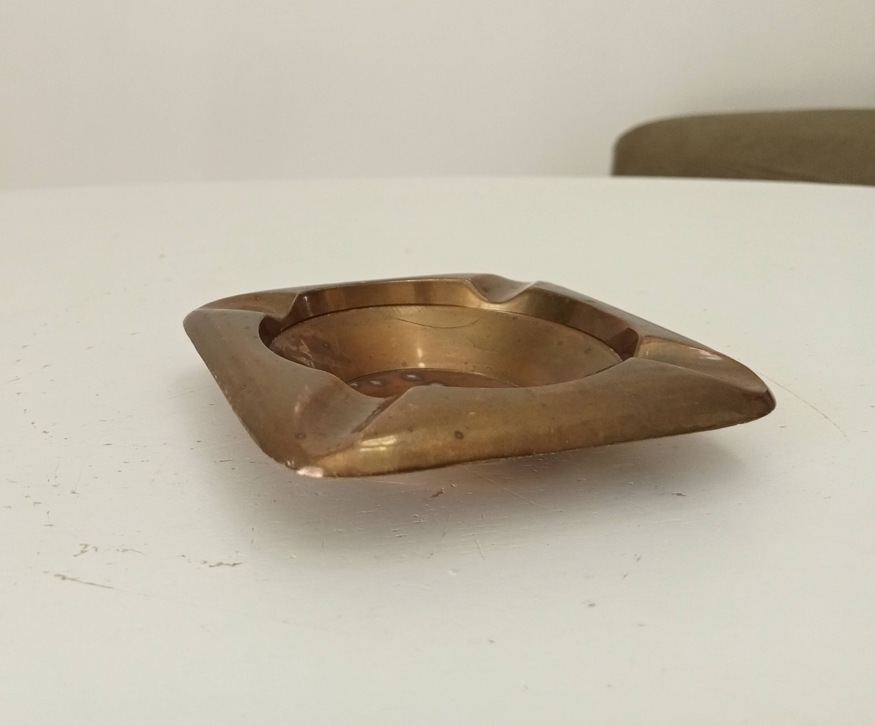 Vintage designer ashtray in solid gold brass