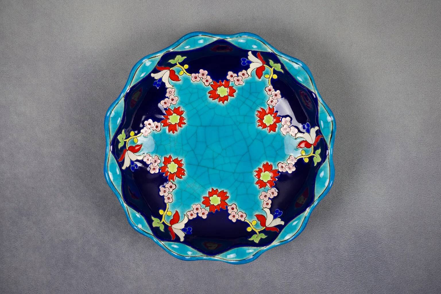 Longwy coupe model Roxane – Floral enamels on a crackled turquoise background