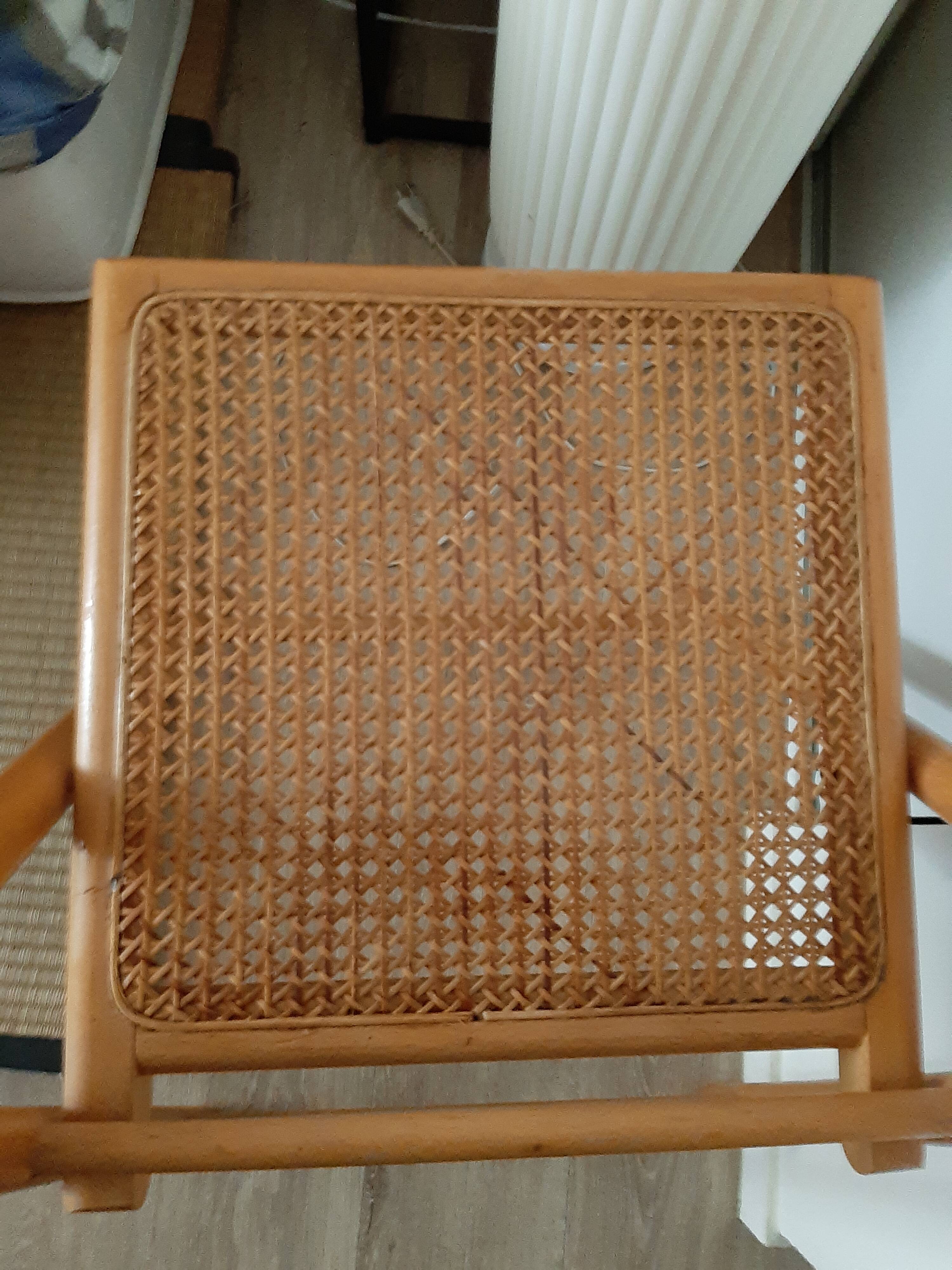 Folding chair in cannage
