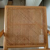 Folding chair in cannage
