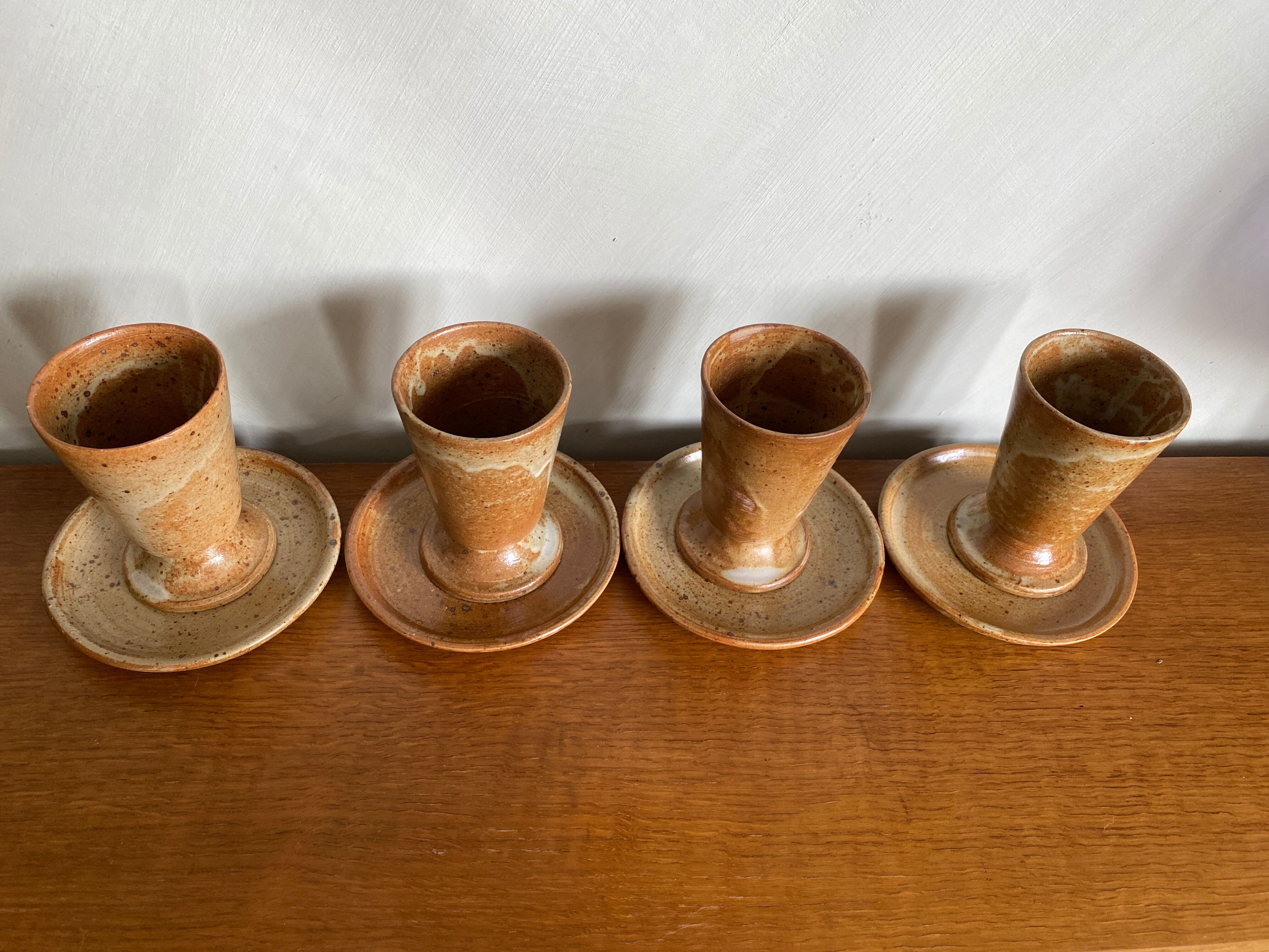 Set of 4 vintage stoneware coffee cups and plates