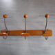 Old coat hangers in wood and metal