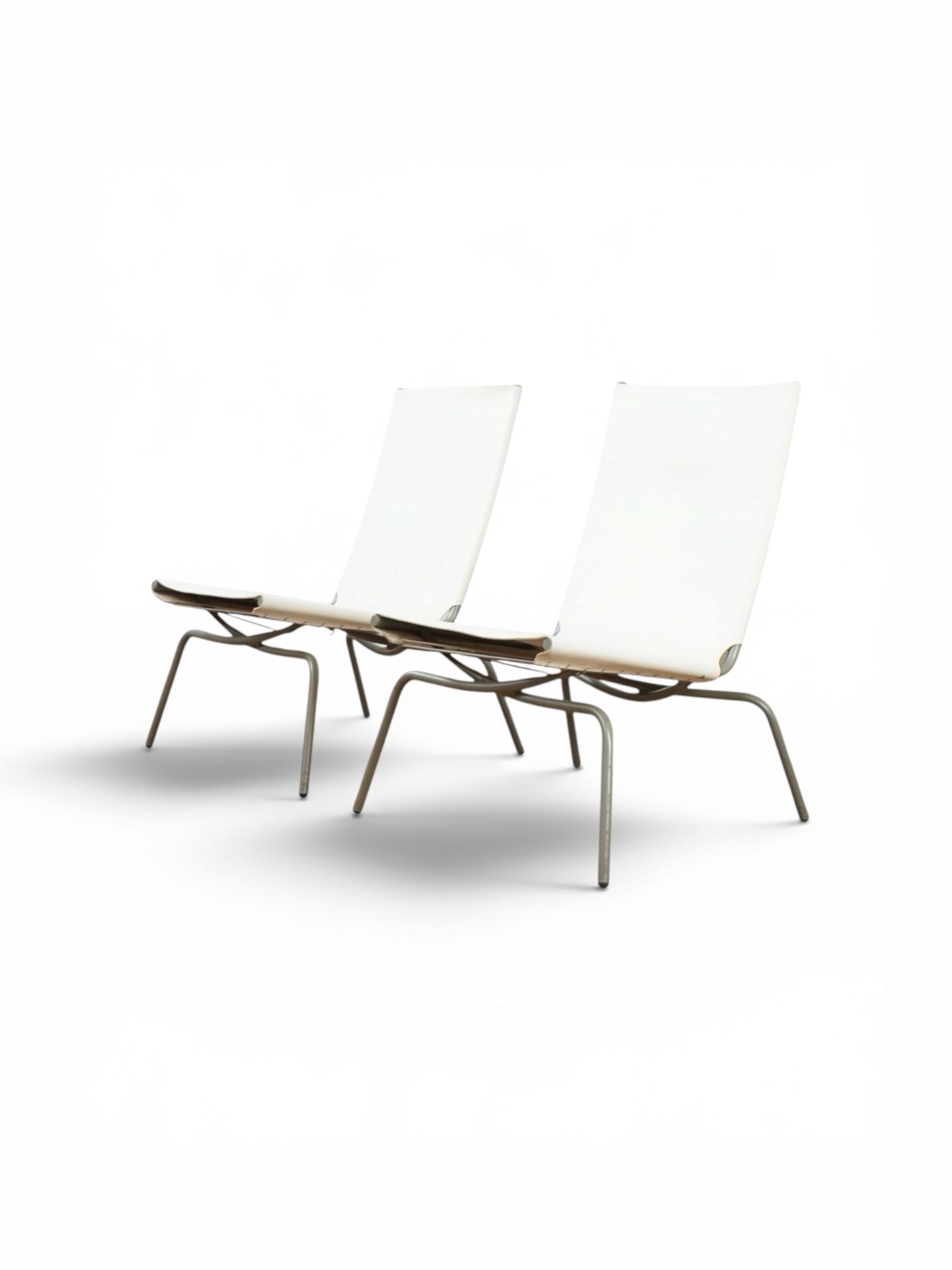 Set of 2 Crossed Legged lounge chairs by Fabiaan van Severen.