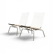 Set of 2 Crossed Legged lounge chairs by Fabiaan van Severen.