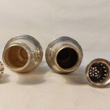 Set of two silver metal sprinklers