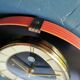Horloge formica vintage pendule murale silencieuse "SMI noir orange"