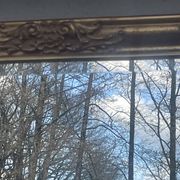 vintage bevelled mirror in rectangular shape, stucco and gilded wood in Louis XV baroque style