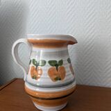 Ceramic pitcher with apple motif