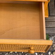 Dresser and its bedside table in rattan caning and vintage oak from the 1970s.