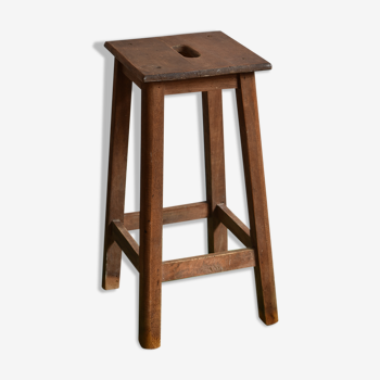 Ancient wooden workshop stool