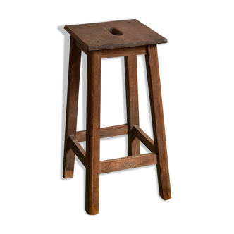 Ancient wooden workshop stool