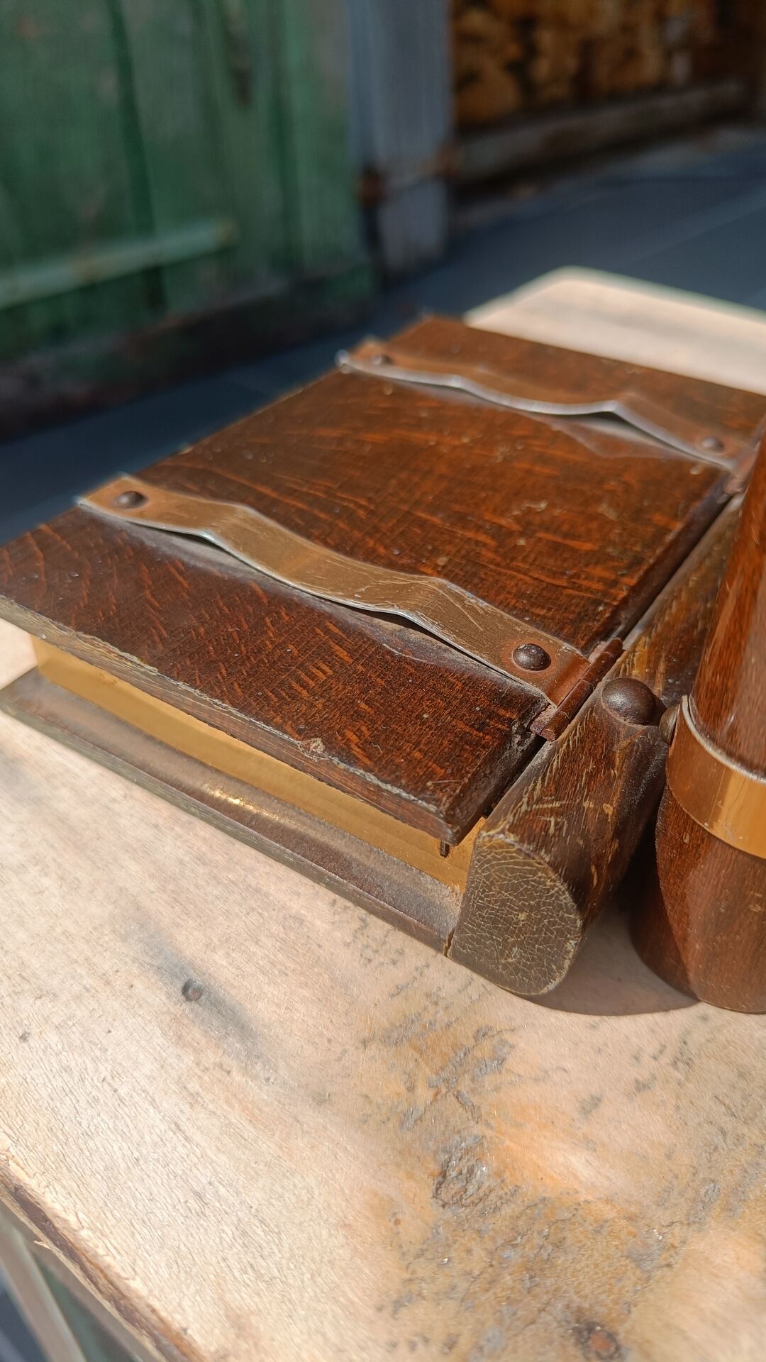 Wooden trompe-l'œil bookends with a book and box