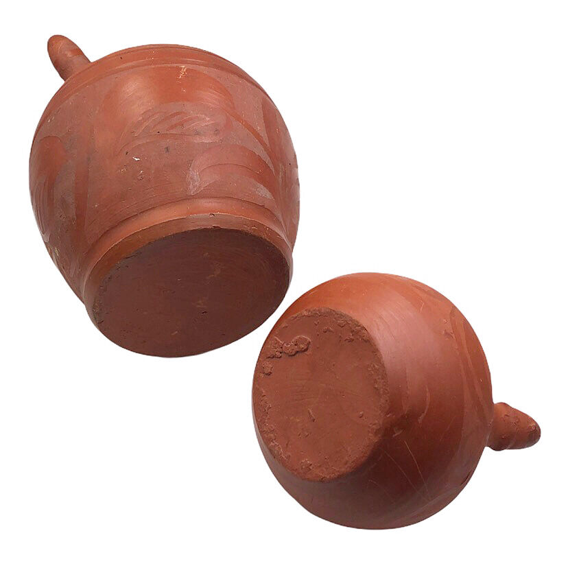 Two terracotta gargoyles