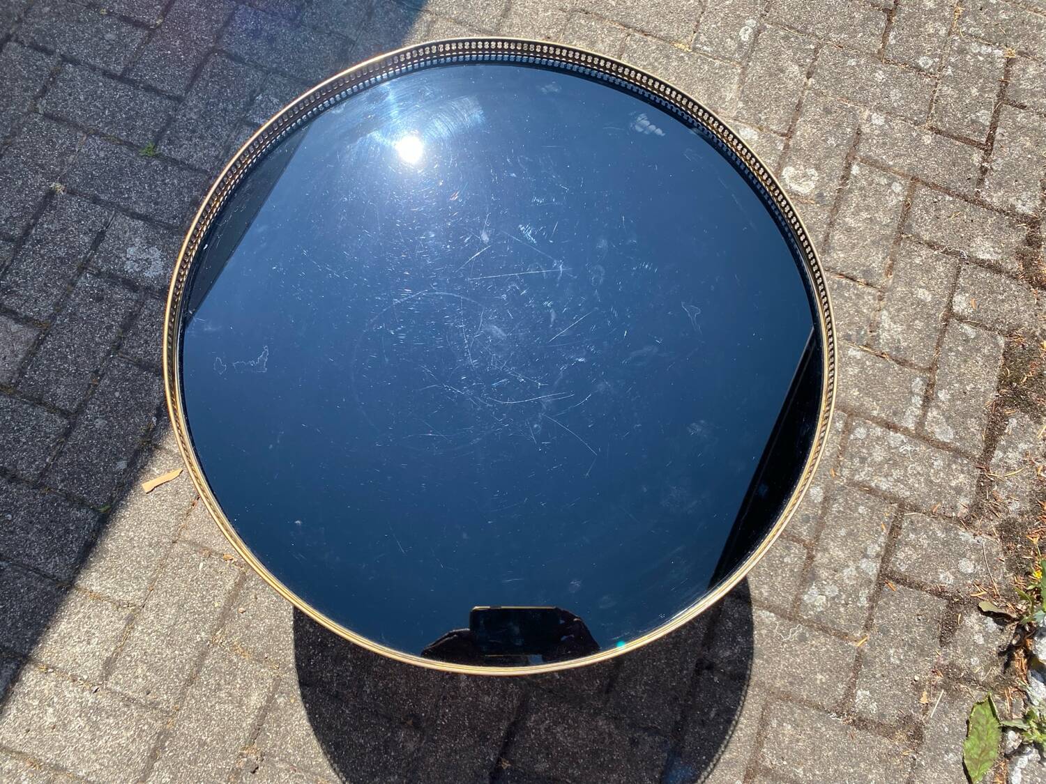 Neoclassical coffee table in black opaline glass and gilt bronze, circa 1970
