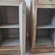 Pair of antique bedside tables with a green patina